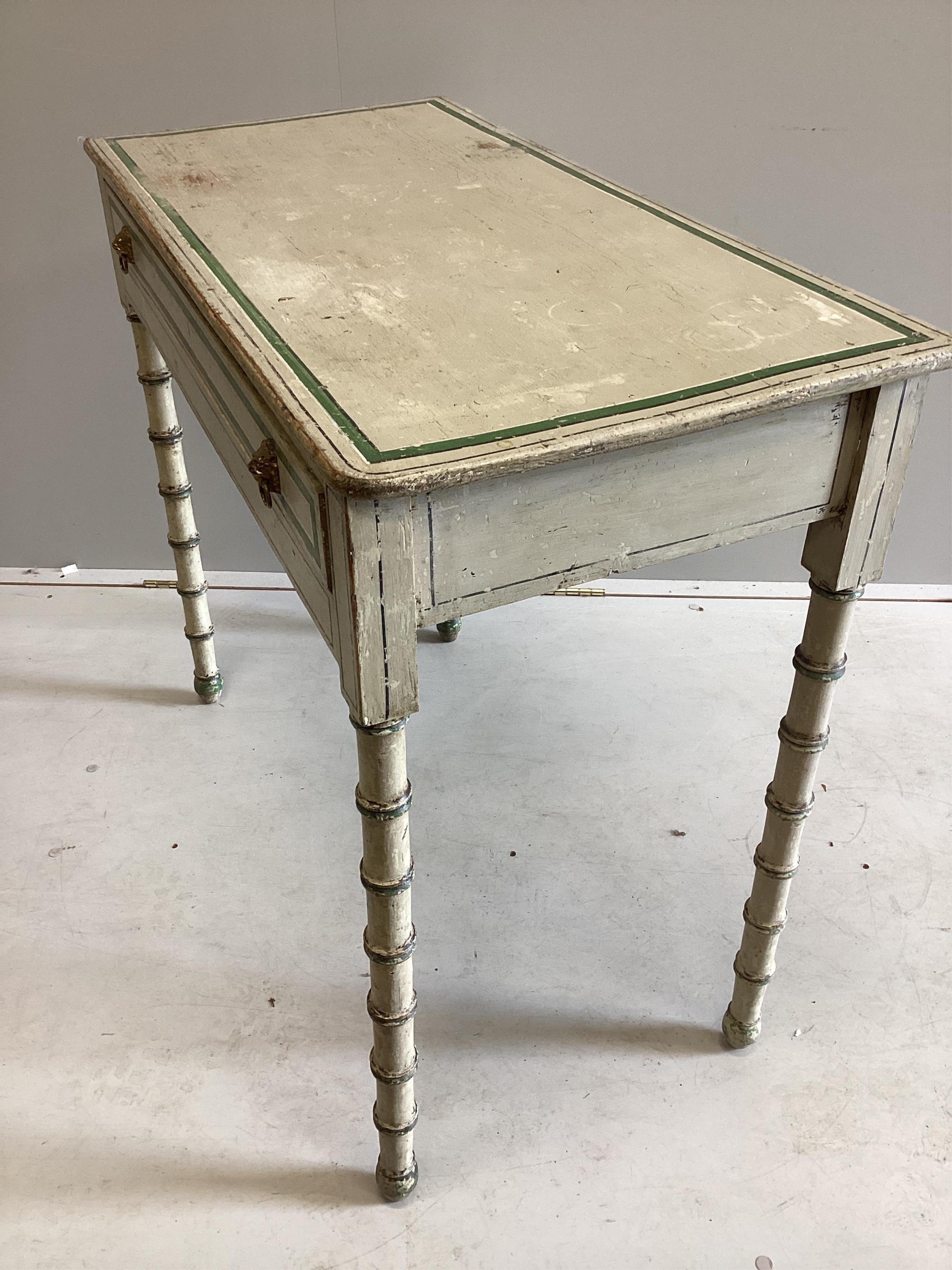 A Regency and later painted simulated bamboo side table in the manner of Colefax and Fowler, width 91cm, depth 44cm, height 78cm. Condition - fair